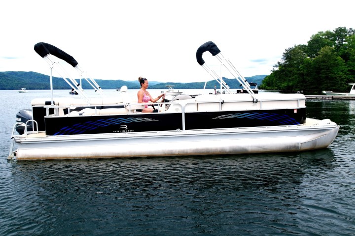 a boat sitting on top of a body of water